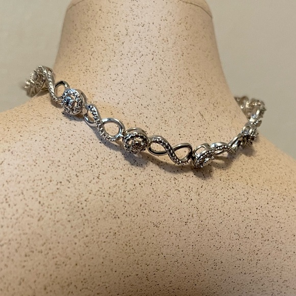 Peoples Diamond Accent 925 Infinity Bracelet - Picture 1 of 4